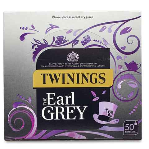Twinings Earl Grey tea packaging with decorative elements on a white background