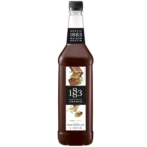Bottle of 1883 Dubai Chocolate syrup on a white background