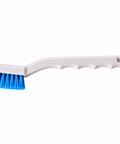 A plastic cleaning brush with a white handle and bright blue bristles, shown against a plain white background.